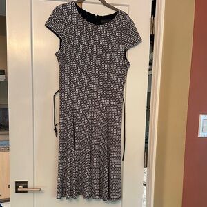 Jessica Howard Navy, cram & white  dress with repeating floral pattern.